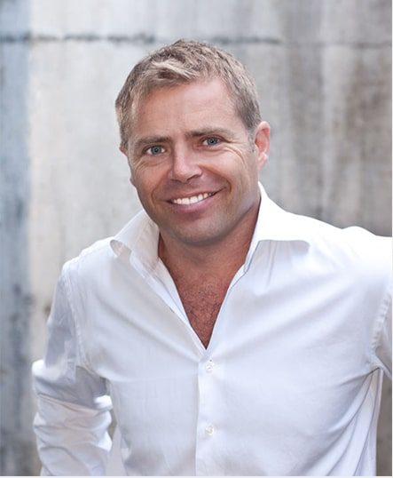Andrew Orr, smiling, in a white shirt